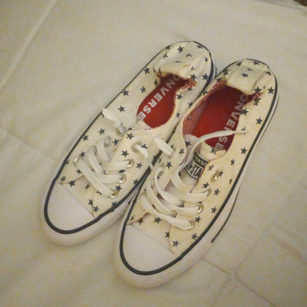 Converse slide on sneakers size 5,white with navy blue stars ,red insides.New